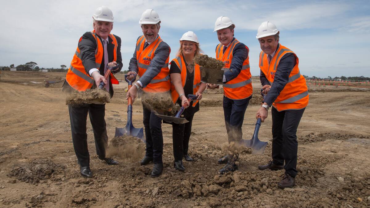 BREAKING GROUND: D'Orsogna managing director Brad Thomason, D'Orsogna director Marco D'Orsogna, Member for Yurok, Ros Spence, Victoria's Employment and Industry Minister Ben Carroll, and D'Orsogna director Eugene D'Orsogna at the sod turning in Merrifield Business Park, Melbourne.