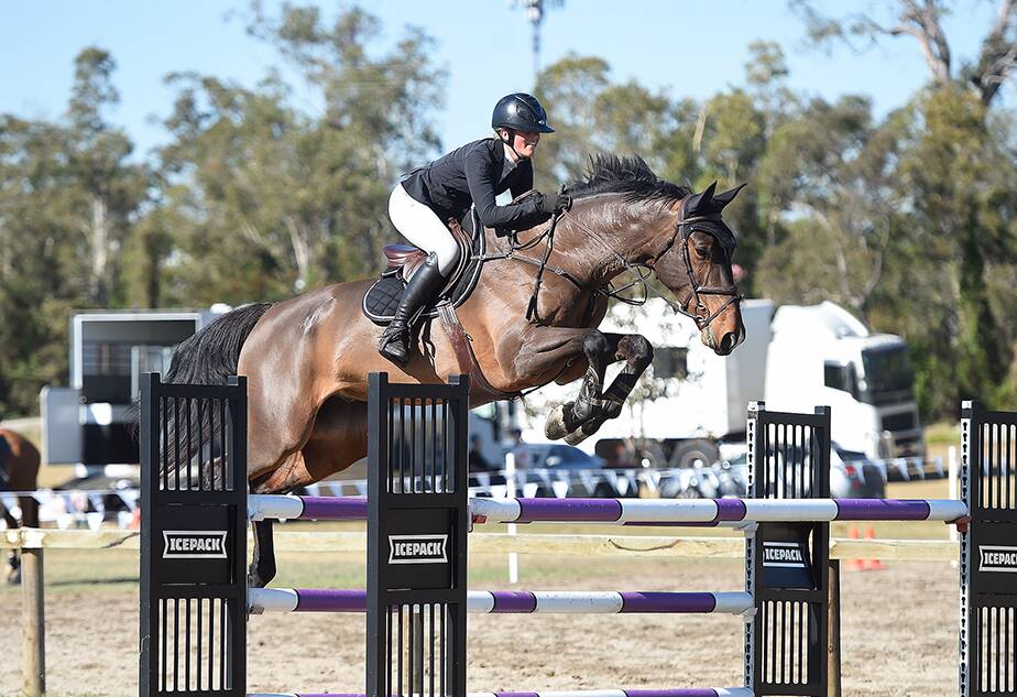 Victoria Hoy in action during a showjumping competition. Picture by Oz Shotz