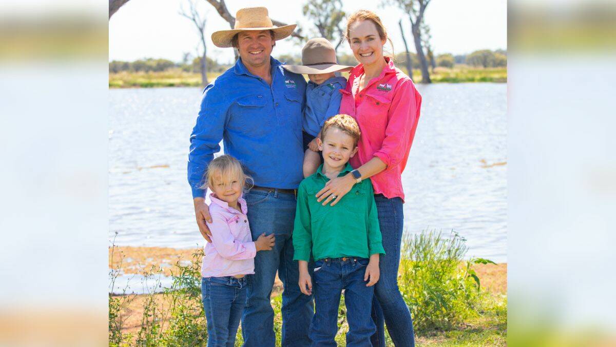 Scott and Hannah Baker and family on their Doonkami Stud property where they breed Australian Whites. Picture supplied