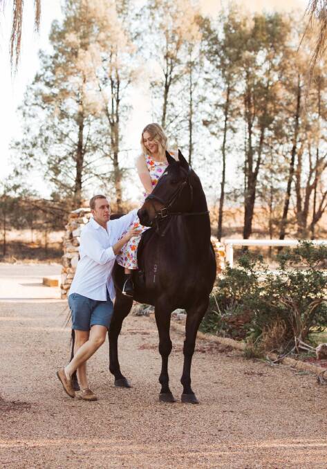 BITTERSWEET: Tom and Emily Blackburn with Murphy the gelding on Sunny Park's driveway, where the couple began their married life.