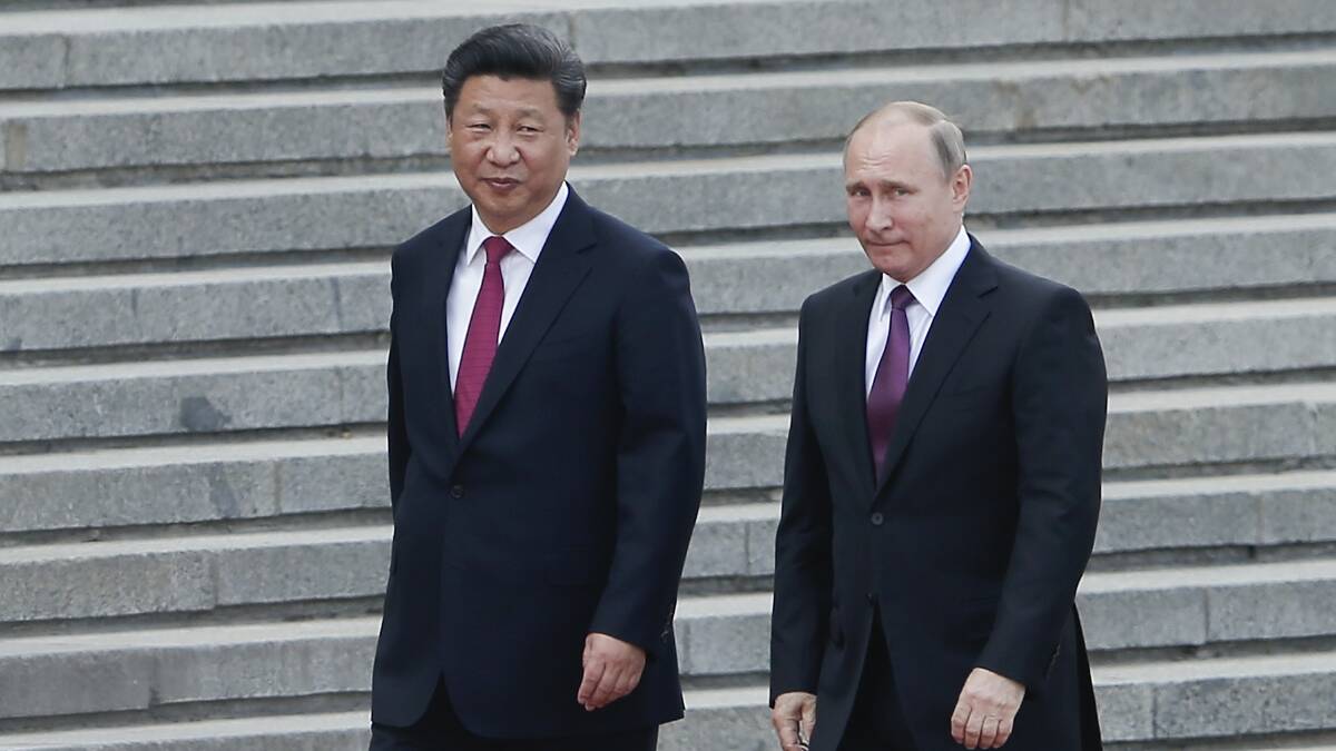World leaders are calling on Xi to isolate ally Vladimir Putin over Ukraine. Picture Getty Images