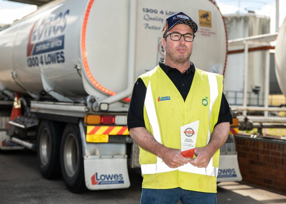 HUMBLE HERO: Truck driver Michael Thompson has been recognised for saving a man's life while on the job. Picture: Brandon Long.