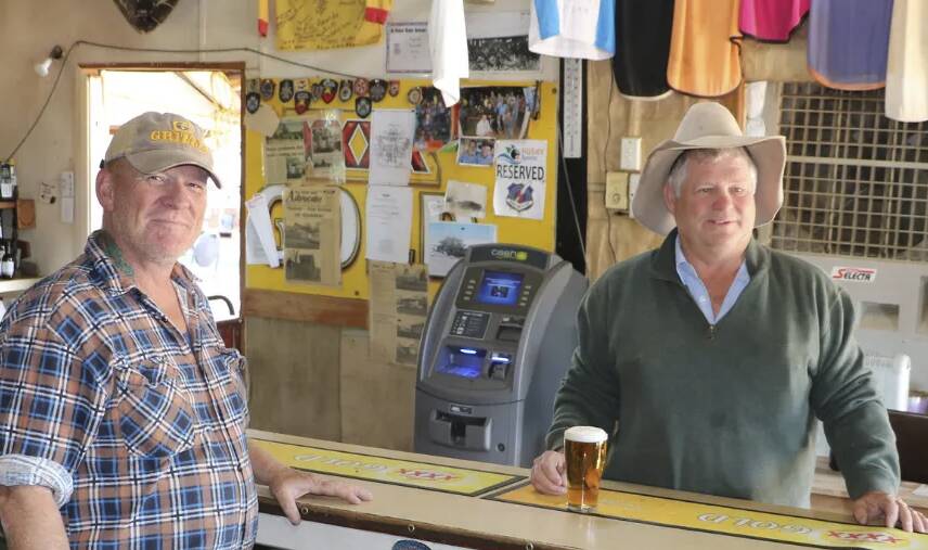 READY FOR ACTION: Hebel Hotel publican Mervin Pullen (left) and owner Frank Deshon are ready to serve drinks and food to more patrons when border restrictions are lifted. Photo: SQ Landscapes.