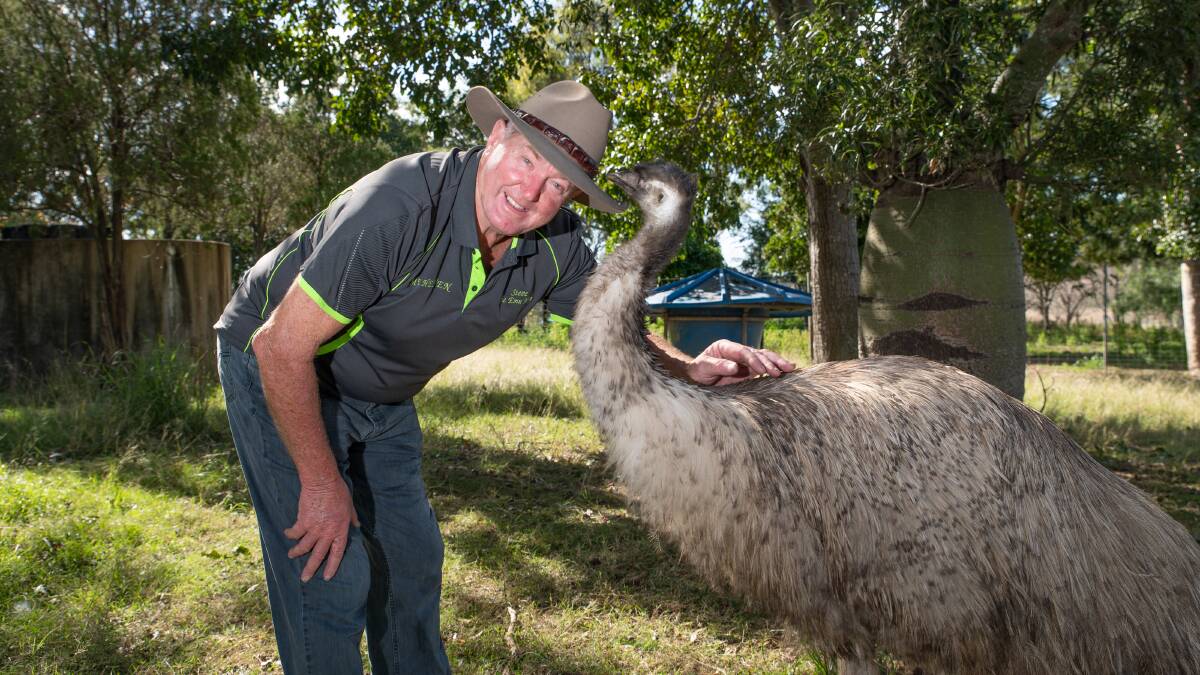 Emu Heaven owner Steve Schmidt with one of their rare white emus.