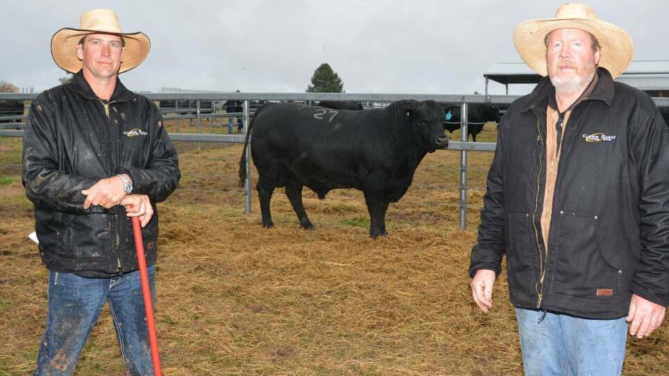 Ben Grabham Clunie Range and principal, Brett Guest with Clunie Range Radford R91, the $85,000 top-priced bull bought online by the Lane Brothers, Wilano Angus, Dunedoo.