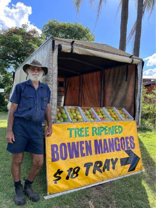 Peter Tucker with his travelling mango stall. Photo: Supplied