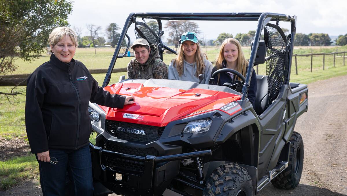 GROWING DEMAND: Training and Skills Minister Gayle Tierney along with South West TAFE students in a new quad bike as part of new equipment purchased for new agriculture courses at South West TAFE in Colac.