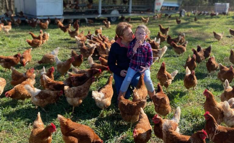Jo Broad with Lexie Stevens on Long Flat farm where Lachie's Farm Fresh Eggs come from. Picture supplied