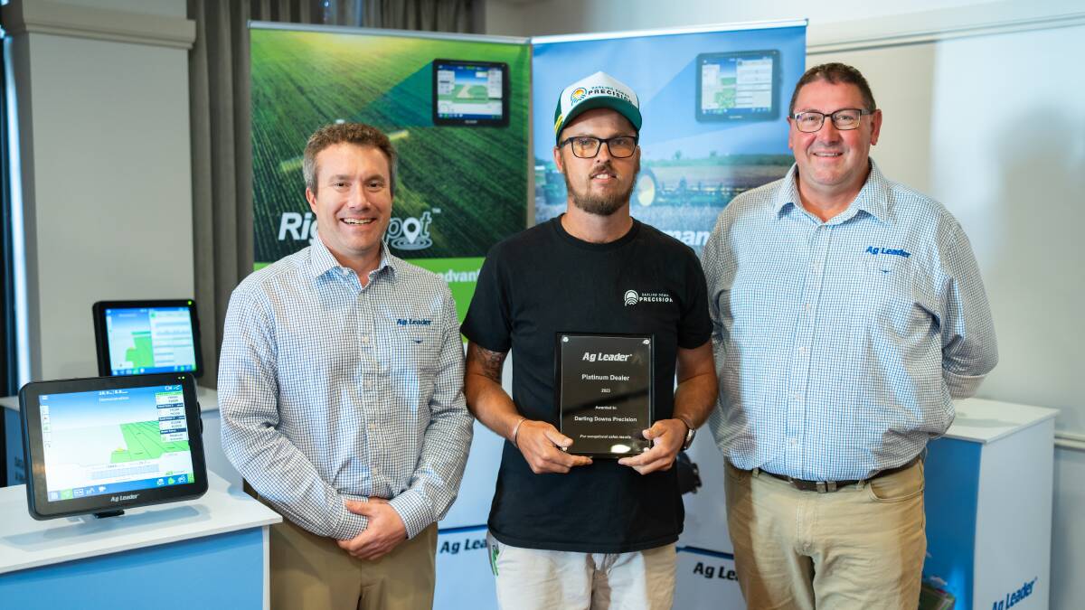 Ag Leader international business manager, Matt Wolfe (left), and Ag Leader Asia Pacific sales manager, Douglas Amos (right), congratulate Ben Tarrant from Darling Downs Precision. Picture supplied