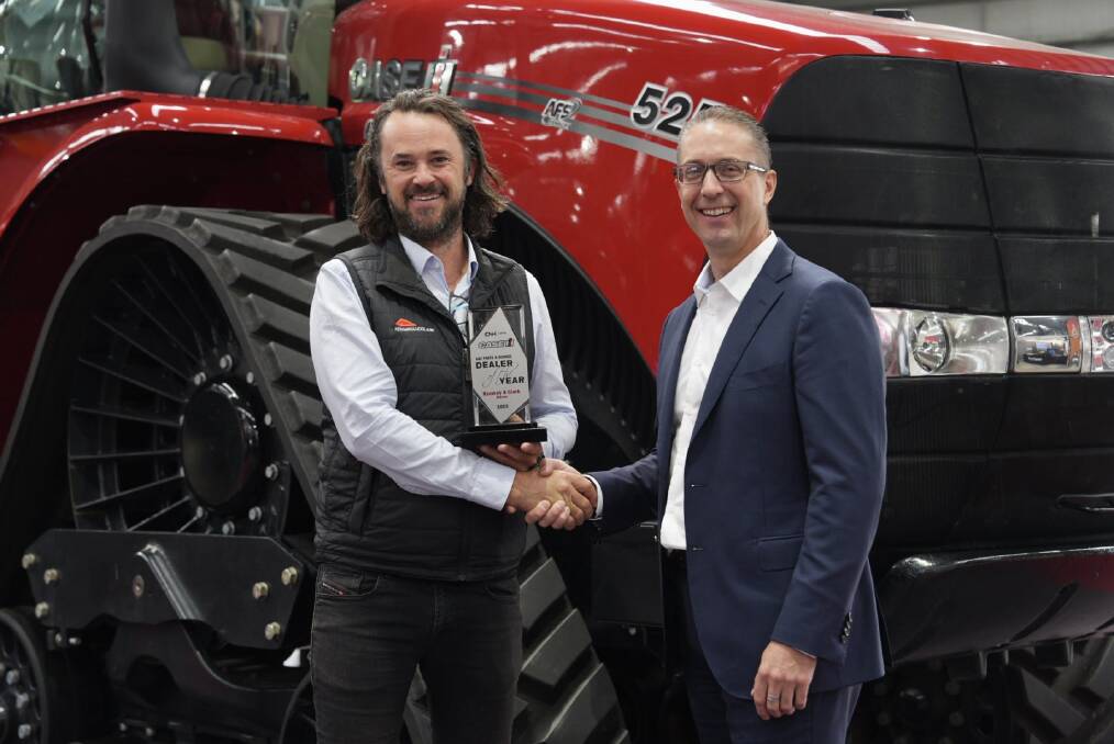 Kenway & Clark chef executive officer Pete McCann receiving the Case IH parts and service Dealer of the Year award from CNH head of parts and service ANZ Heath Joiner. Picture supplied