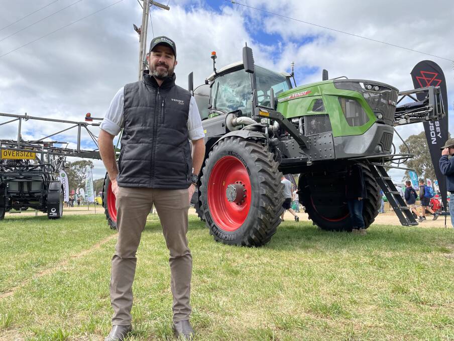 Rogator sales manager Alex Milsom with the sprayer at the Henty Machinery Field Days. Picture Andrew Norris