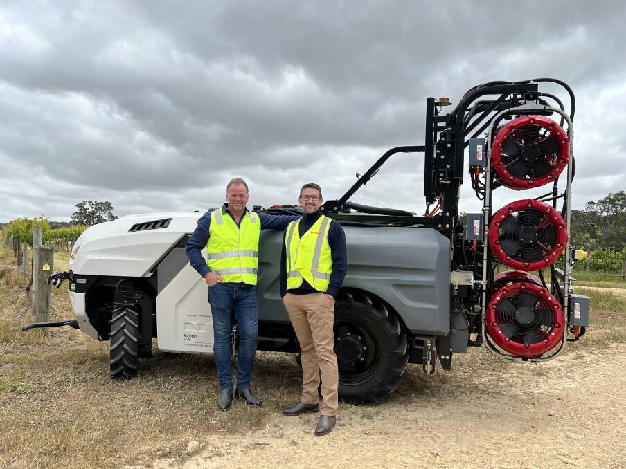 Robotics Plus co-founder and chief executive Steve Saunders and Croplands general manager Sean Mulvaney with Prospr in the Barossa Valley. Picture supplied