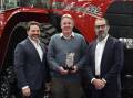 Larwoods Ag director Mathew East is congratulated by CNH managing director for Australia and New Zealand Brandon Stannett and CNH business director - agriculture ANZ Aaron Bett on winning the Case IH Dealer of the Year award for one to two branches. Picture supplied