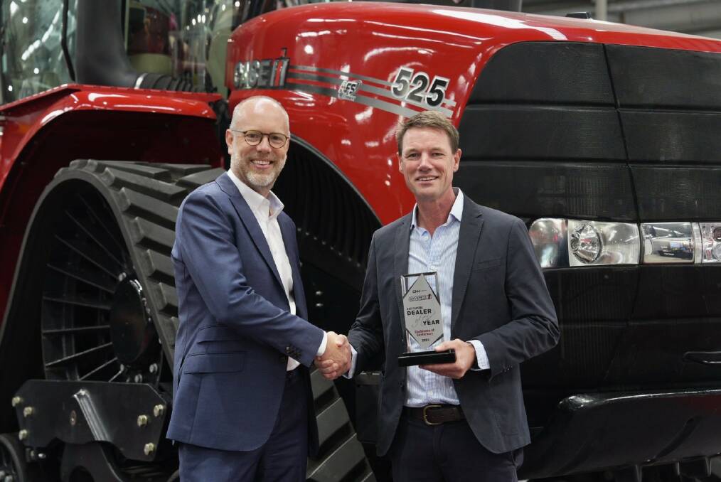 Cochranes of Canterbury dealer principal Chris West is congratulated by CNH Capital managing director for ANZ Matt Dowling after receiving the Case IH CNH Capital Dealer of the Year award. Picture supplied