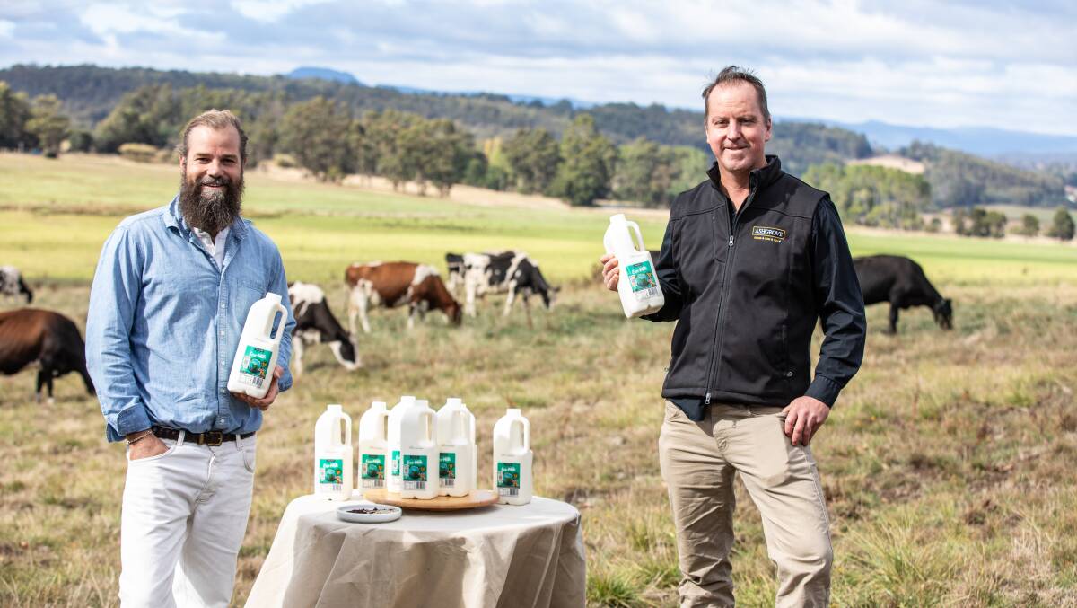 Sea Forest CEO Sam Elsom and Ashgrove Managing Director Richard Bennett holding Eco-Milk. Photos by Eve Woodhouse.