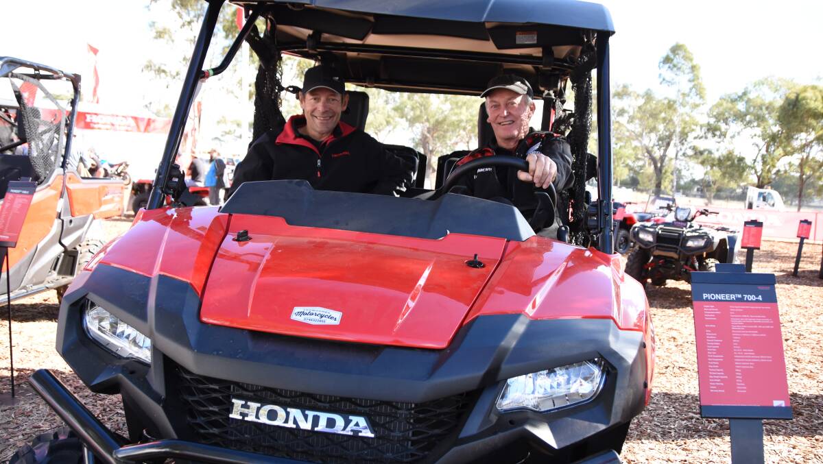 ON SIDE: Justin Jansen, Toowoomba Motorcycles, and Craig Hartley, Dalby Moto, in the new Honda Pioneer SXS 700 M2 side by side vehicle.