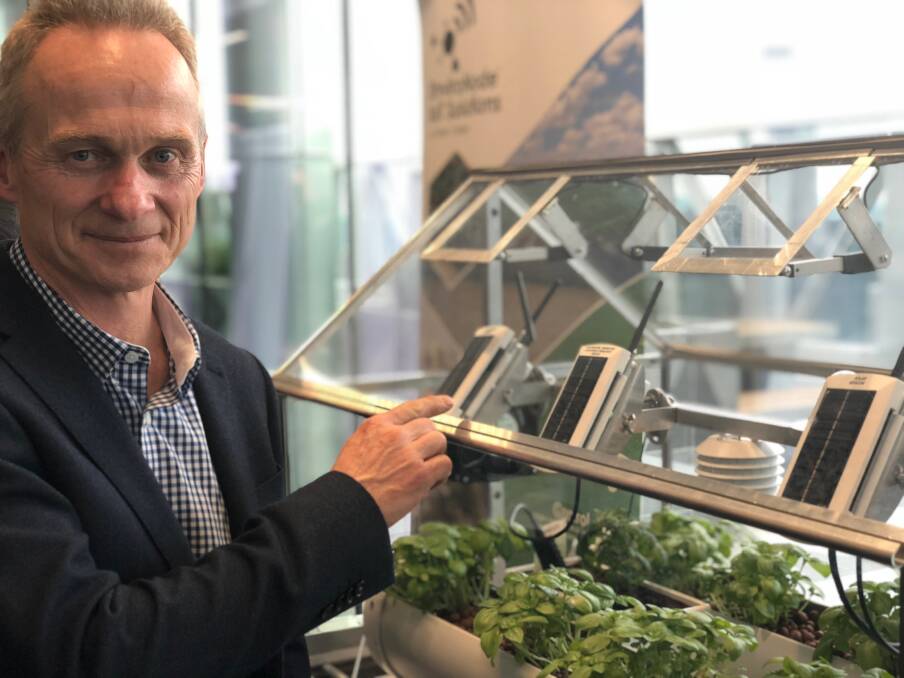 IN CONTROL: Dosec Design, managing director, Ric Otton showcasing managed environment technology for greenhouses at the KPMG smart food and fibre expo held in Melbourne. 