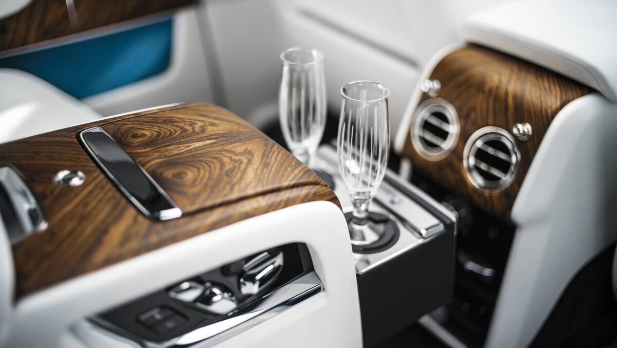 CHAMPAGNE LIFESTYLE: Individual rear seating in the Rolls-Royce Cullinan makes room for a fridge, champagne and whiskey holders