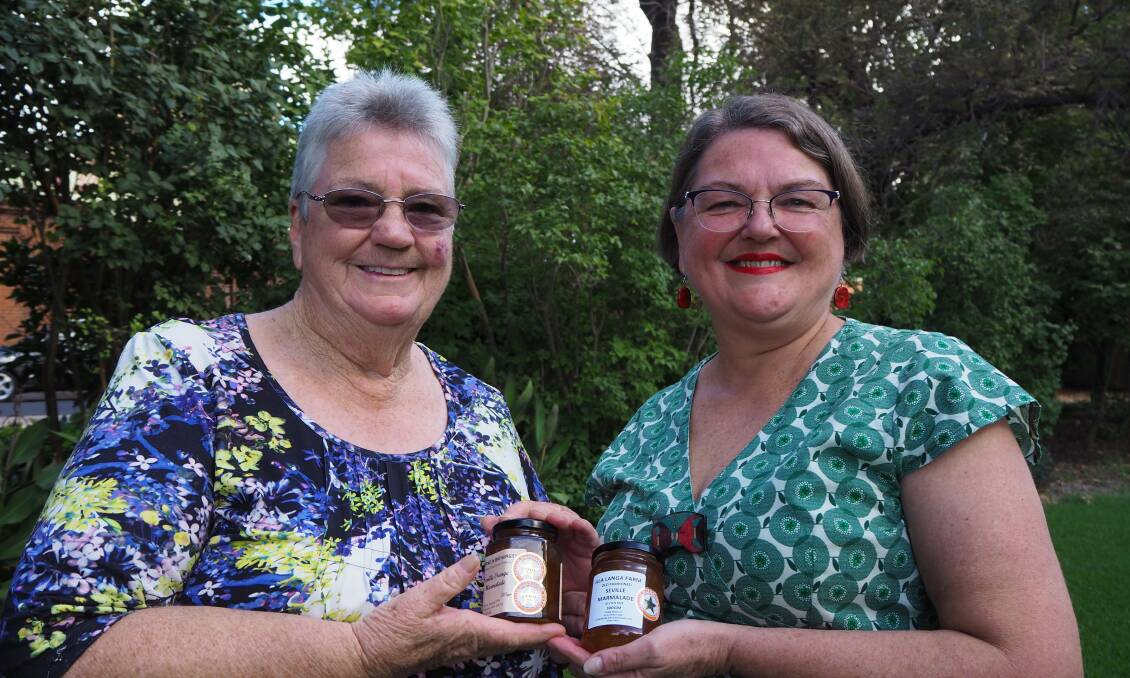WORLD RENOWNED: Borne in Bathurst proprietor Jan Young and Illa Langa Farm owner Sheena Rigby with their award-winning marmalade. Photo: SAM BOLT