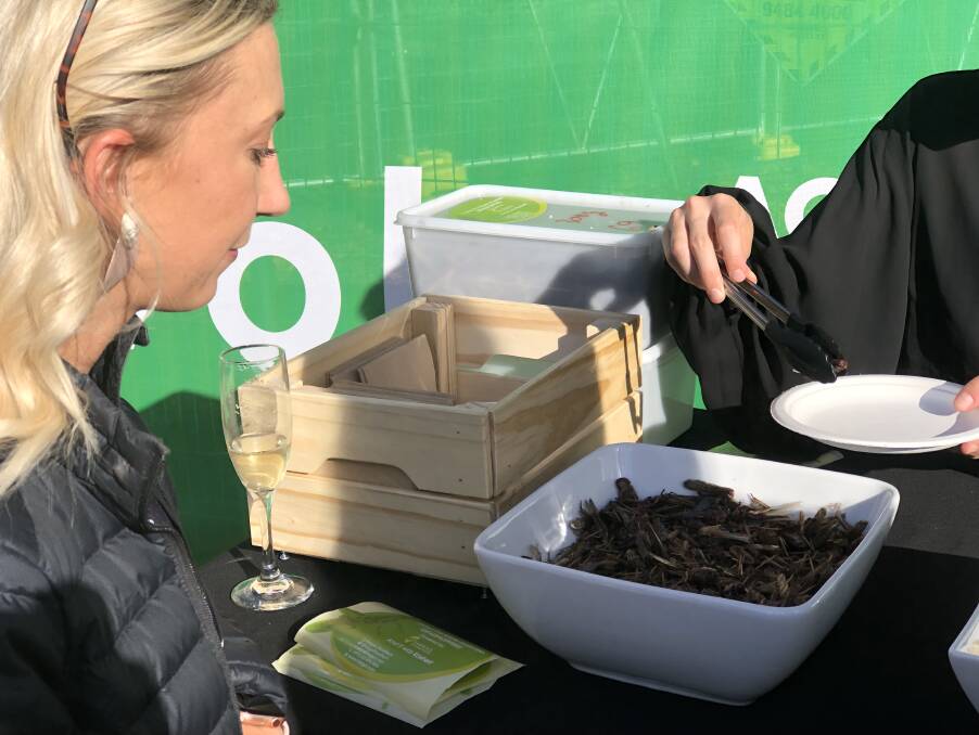 ON THE MENU: AgriFutures Australia, communications coordinator, Dallas Pearce samples some grasshoppers at the EvokeAg technology conference held in Melbourne last week. 