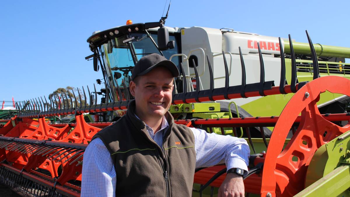 ALL CLASS: Claas Harvest Centre, product manager, Jonathon Ham with the new Claas Convio draper front at Commonwealth Bank AgQuip.