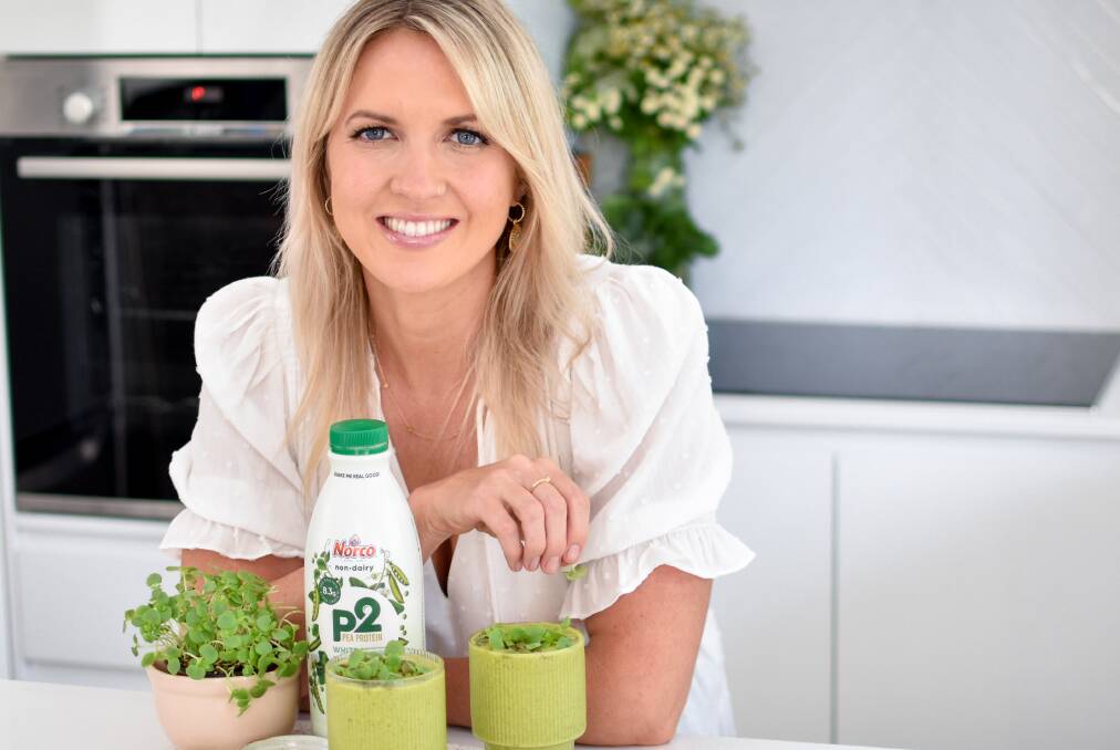 Dairy co-operative Norco's new plant based P2 protein mylk is put to the test in the kitchen by nutrionist, Georgia Barnes. Photo: Norco