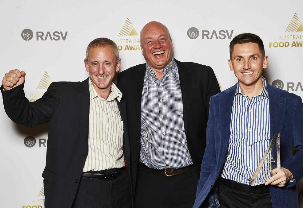 Rivalea Australia staff celebrating Riverview Farms roast pork's recent Australian Food Awards wins, Ian Prunell, Mark McKenzie and Ashley Hoffmann.