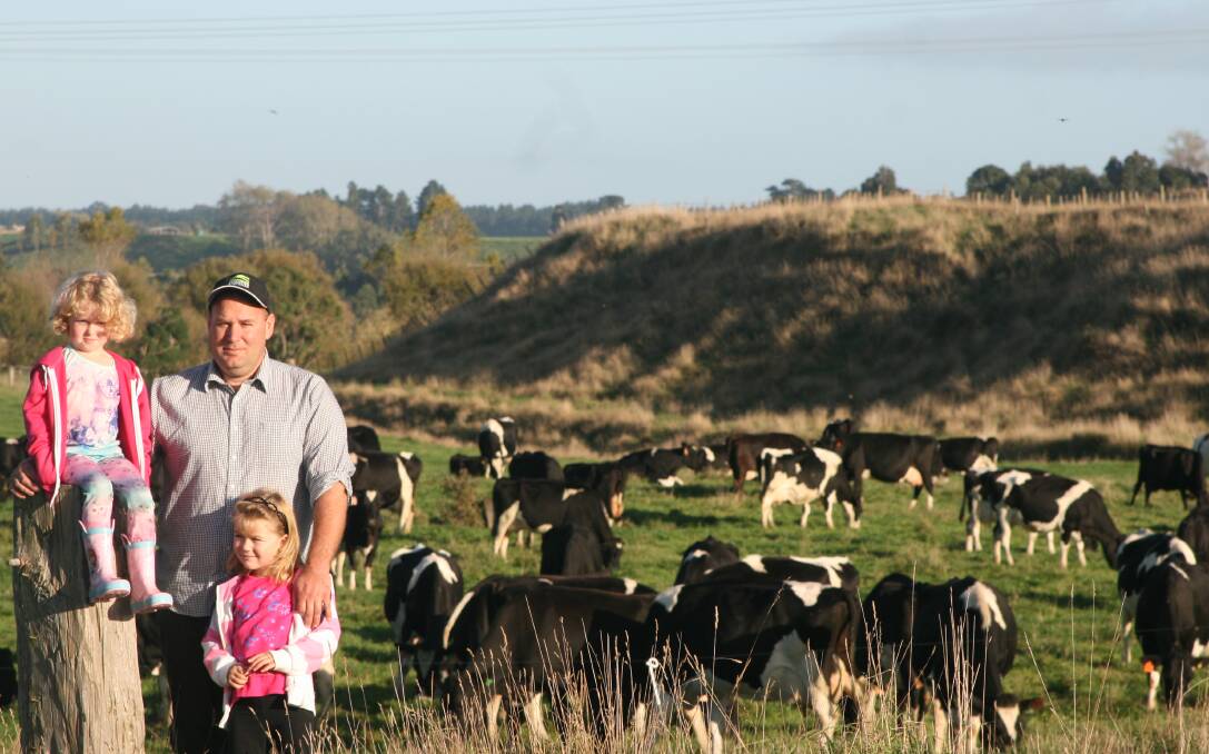 Federated Farmers of New Zealand vice president, Andrew Hoggard, with daughters Michaela and Payton on the family's Fielding dairy farm.