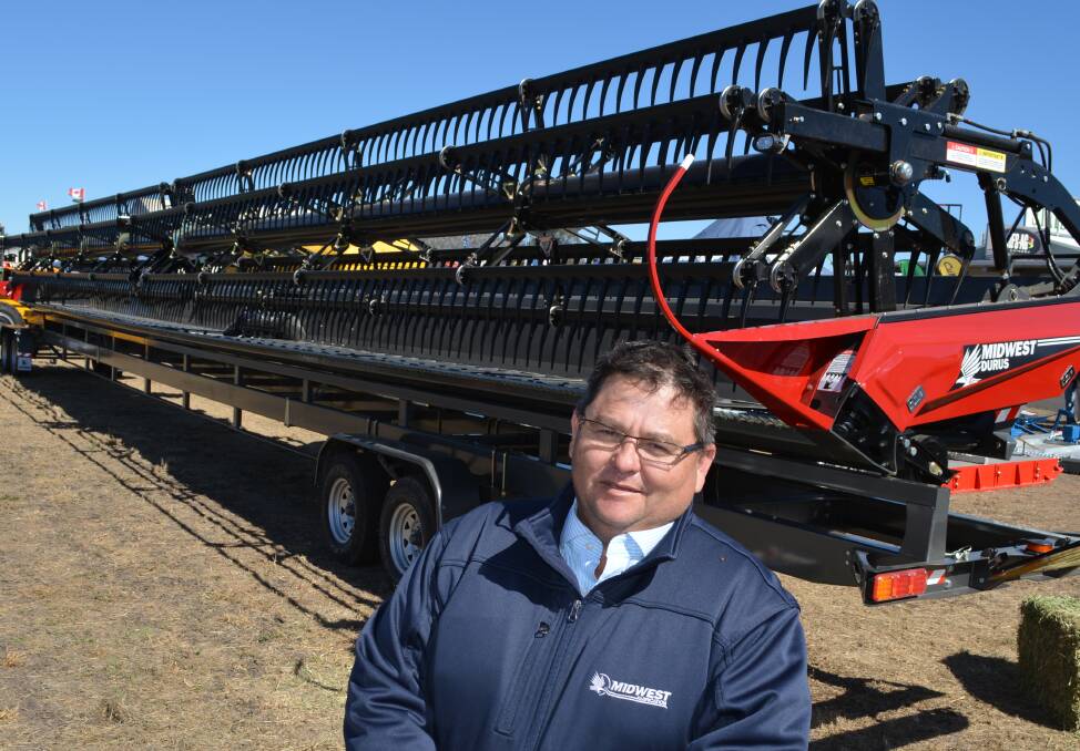 Pictured at last month's AgQuip, Midwest Fabrication's, Anthony Wenning, says the company's big 18-metre Durus platform not only makes grain harvesters more efficient, it is built sturdily to stand the test of time in Australian paddocks.