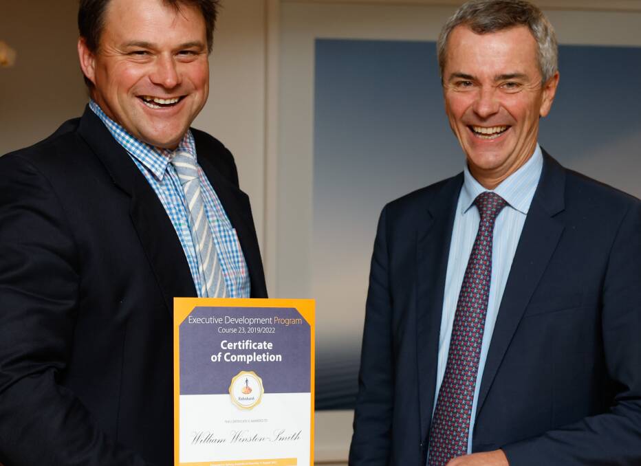 Will Winston-Smith, from Rowena in northern NSW, receives his course graduation certificate from Rabobank Australia chief executive officer, Peter Knoblanche, at Rabobank's 23rd executive development program dinner in Sydney.
