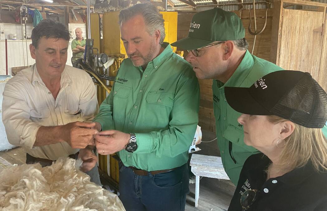 Southern Tablelands grazier,Ted O'Kane, "Springsure", Hall, talks wool with Nutrien's global interim president and chief executive officer, Ken Seitz; global retail president, Jeff Tarsi, and executive vice president, Noralee Bradley, in the shearing shed at "Hillgrove", Bowning, owned by Scott and Desnee Schlunke - a long way from Nutrien's corporate head office in Saskatoon, Canada.