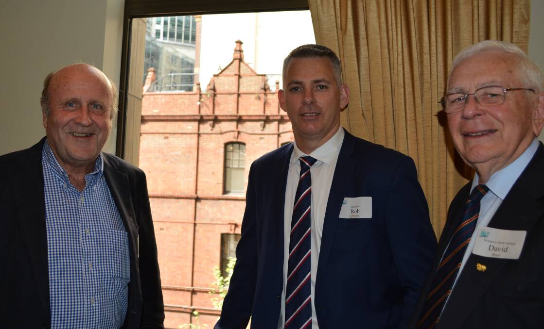 Landmark managing director, Rob Clayton (centre) with former leading names with Landmark's predecessor companies, Ted Harnett, Wesfarmers Landmark wool, livestock and real estate general manager when he retired in 2002, and Dalgety's NSW general manager from 1984 to 1988, David Boyd.