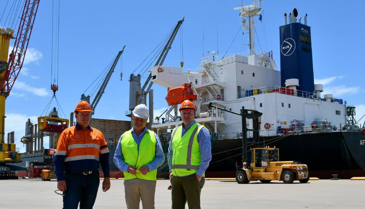 Centrex managing director, Robert Mencel and chief financial officer, Cormac Byrne, at the Port of Townsville as the first cargo from its phosphate mine is loaded, with the account manager for the job at supply chain partner, Aurizon, Garry Davidson (left). 