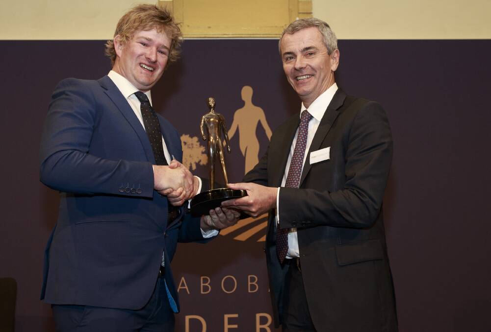 Rabobank emerging leader award winner and ambitious organic farmer, Nathan Free, Lake Bogo, Victoria receives his award from Rabobank's Australia and New Zealand managing director, Peter Knoblanche. 