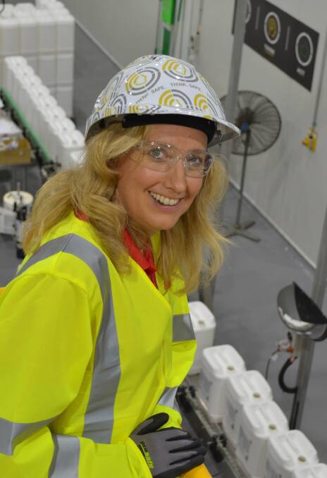 FMC's Australian and New Zealand managing director Kristina Hermanson surveys a container filling line at the company's plant at Wyong in NSW.
