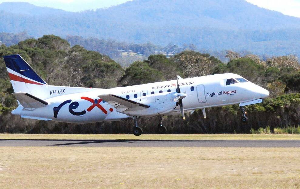 Rex passengers soaring in Qld, WA but Qantas dogfight slows recovery