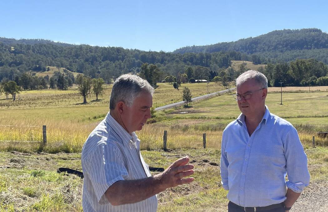 NSW dairy farmer and Regional Investment Corporation customer, Thomas Cooper, Bonalbo, talks disaster recovery loans with RIC chief executive officer, John Howard, who recently met with North Coast producers caught by various natural disasters, from floods to drought and fires within the past five years. Picture supplied.