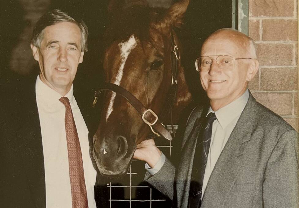 Cox Inall and Associates public relations partners Tim Cox and Neil Inall at Bart Cummings' Randwick stables in 1984. Photo supplied