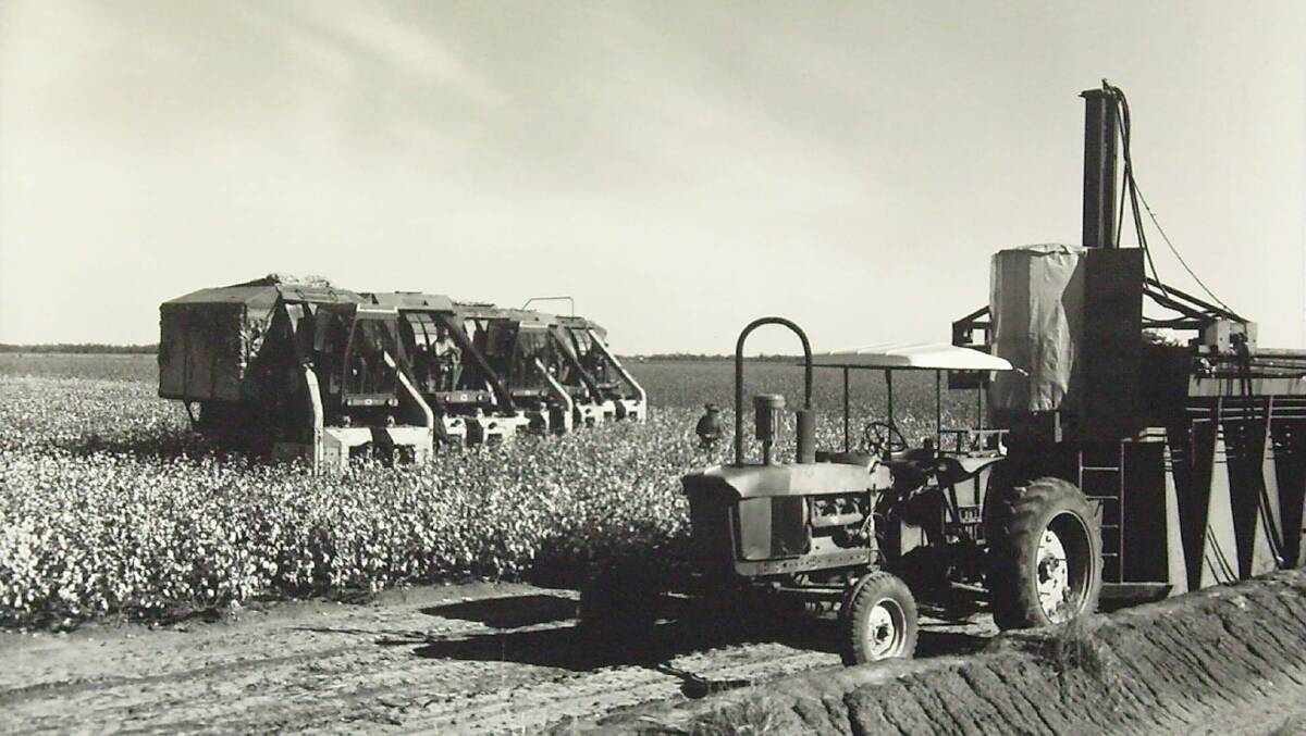 John Deere pickers and a cotton module builder at work in a Namoi Valley cotton crop in the early 1970s when hydraulic module compactors began replacing tractor-pulled trailers which were originally employed to cart loose fibre to gins.