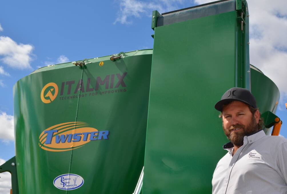 Parkes Steel manager, Garth Simpson, with an Italmix vertical mixer wagon.