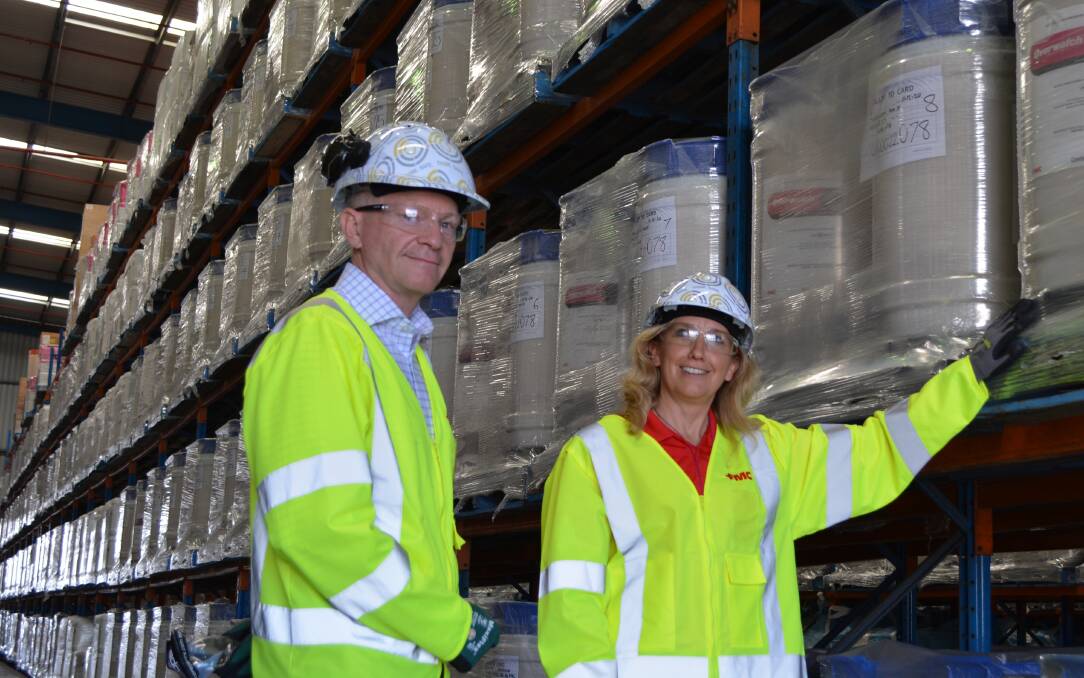 FMC's Australian manufacturing general manager Stephen Poole and Australia and New Zealand managing director Kristina Hermanson with locally-made farm chemical ready for the coming winter cropping season.