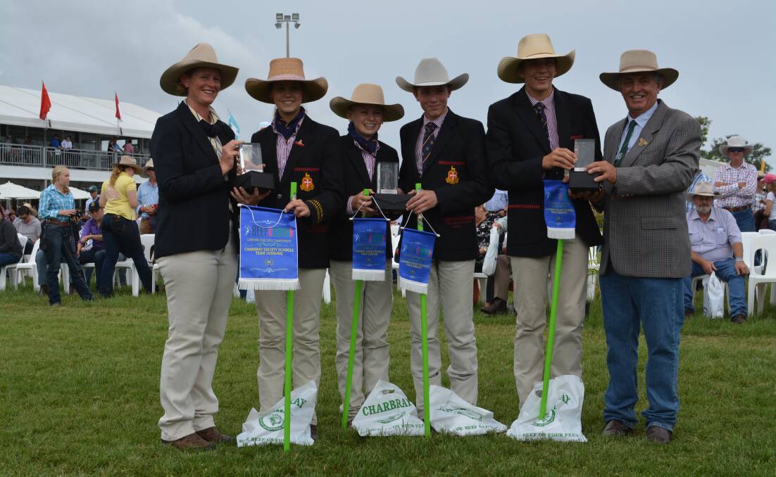Overjudge Tania Sainsbury, Biloela, with the Rockhampton Grammar School team two competitors Isabella Hanson, Moura; Lucy Prentice, Emerald; Marshall Leeson, Moura; and Lachlan Collins, Moura, and Charbray Society president Les Marshall, Greenfields Charbrays, Jambin. 