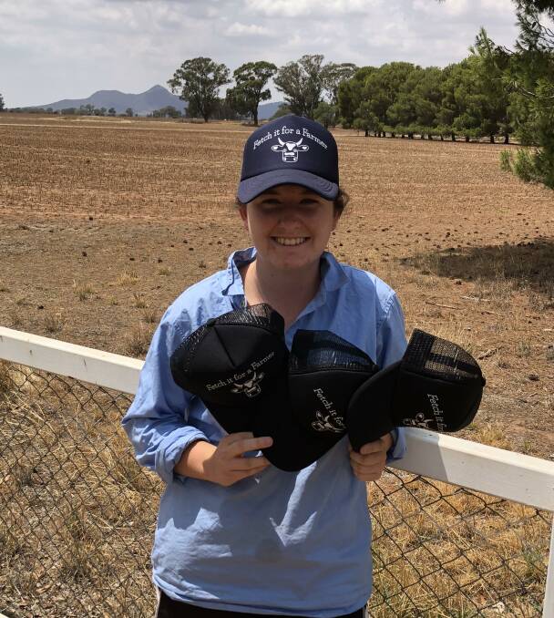 HELPING HAND: Annabelle Kingston, 16, of "Moorakyle" at The Rock is selling Fetch it For a Farmer caps to help those in drought areas. Picture: Nikki Reynolds