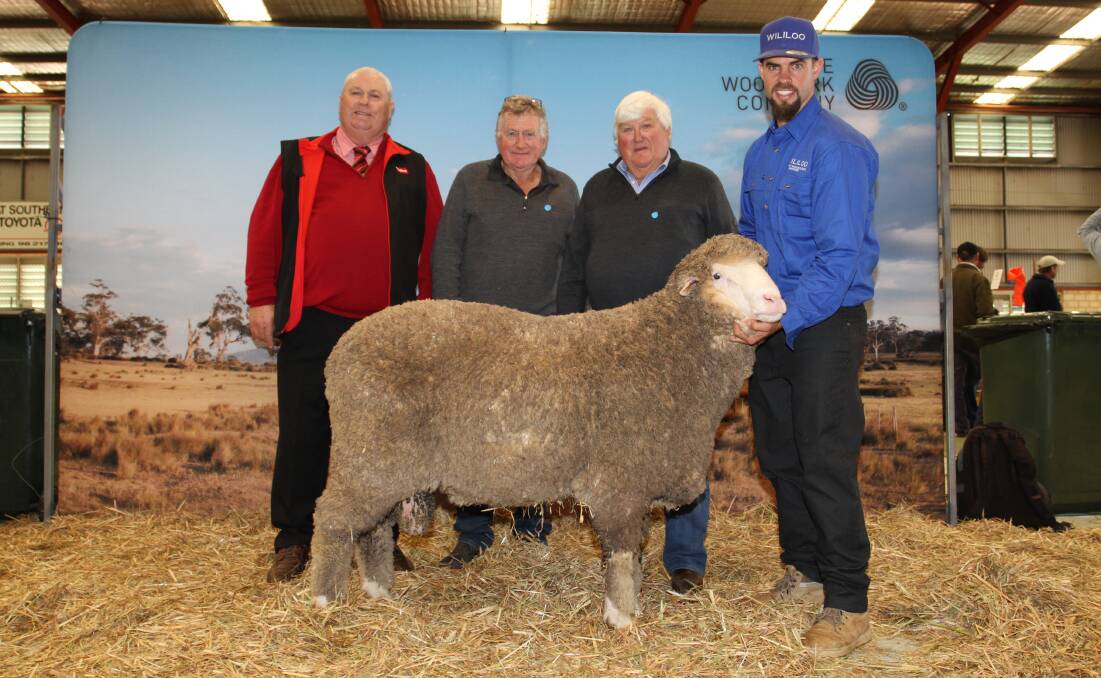 Auburn Valley stud classer Kevin Broad (left), Elders stud stock, buyers Jeffrey and Peter Rintoul, Auburn Valley stud, Williams and Wililoo stud co-principal Rick Wise, Woodanilling, with the Wililoo ram that sold for $5000.
