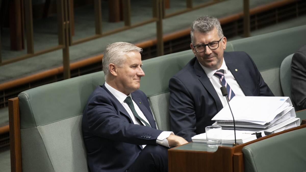 :NO CONFLICT HERE Nationals leader Michael McCormack defended the ability of new Water and Resource Minister Keith Pitt (right) to manage the two portfolios. Photo: Sitthixay Ditthavong