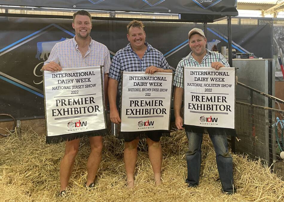 Daniel Bacon, Brookbora Jerseys, Ben Govett, Tandara Brown Swiss, and Glen Gordon, Gorbro Holsteins, all bought outside their chosen breeds when they partnered to purchase Illawarra Wallumlands Sunstorm 8 EX95. They are pictured at International Dairy Week after they each won Premier Exhibitor in their respective breeds in 2022. Photo: Simon Tognola Livestock Promotions.