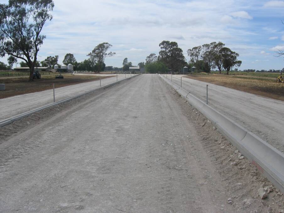 A semi-temporary feedpad usually consists of a formed earthen or rubble base promoting off-site drainage.