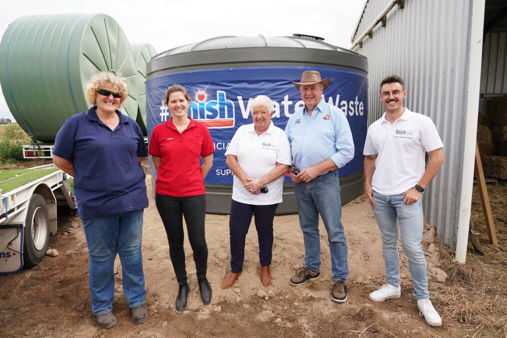 Shepparton dairy farmer Fiona Rourke and representatives from Coles, Rural Aid and Finish.