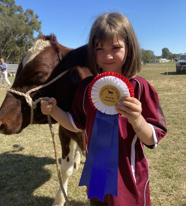 Charlotte Tuhan, 6, tastes show success, taking home a junior champion title.