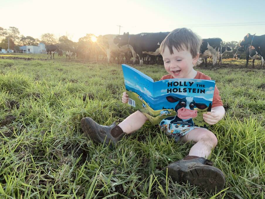 Taree's Albert Nicholson loves his copy of 'Holly the Holstein'.